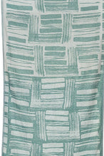 Load image into Gallery viewer, Teal and white patterned towel hanging on a clothesline