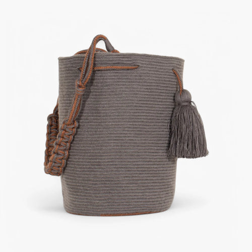 Solid round handmade shoulder bag